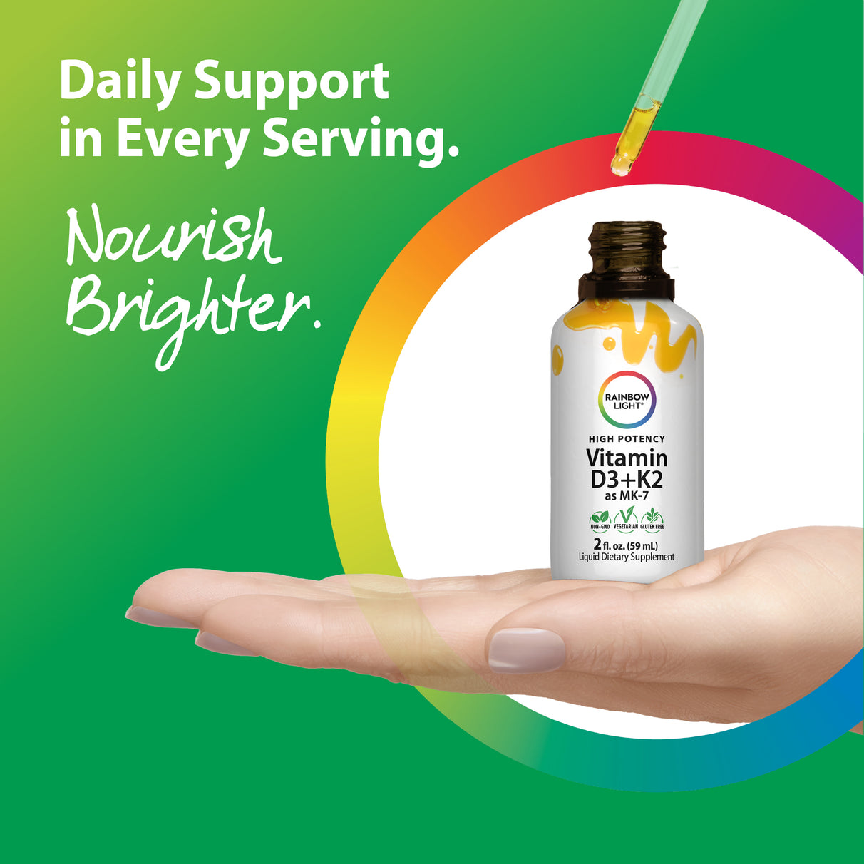 An adult hand holds Vitamin D3+K2 as MK-7 liquid drops with a dropper dispensing a yellow liquid onto the palm.