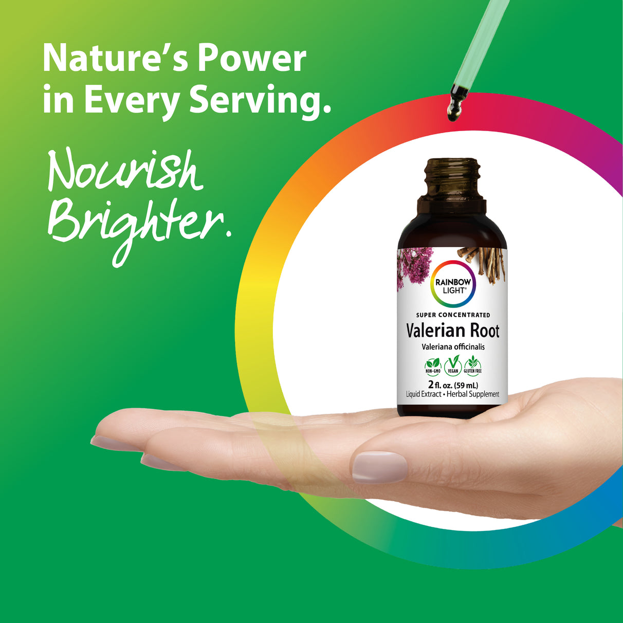 A woman's hand holds a Valerian Root Liquid Extract bottle, with a dropper releasing a drop of liquid above it.