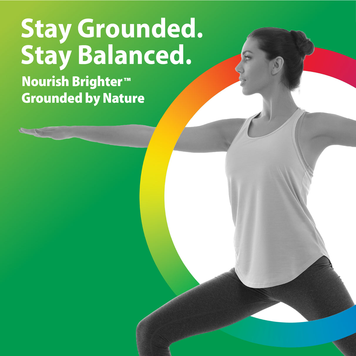 Adult woman in Warrior II yoga pose, with text 'Stay Grounded. Stay Balanced. Nourish Brighter™ Grounded by Nature' for Shilajit.